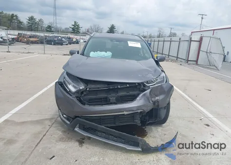 2019 Honda Cr-V Touring z USA, uszkodzony, nr VIN JHLRW2H92KX000812